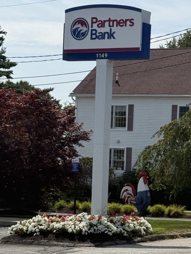 Rainbow-painted rooster statue near Haffner's gas station in Wells, Maine