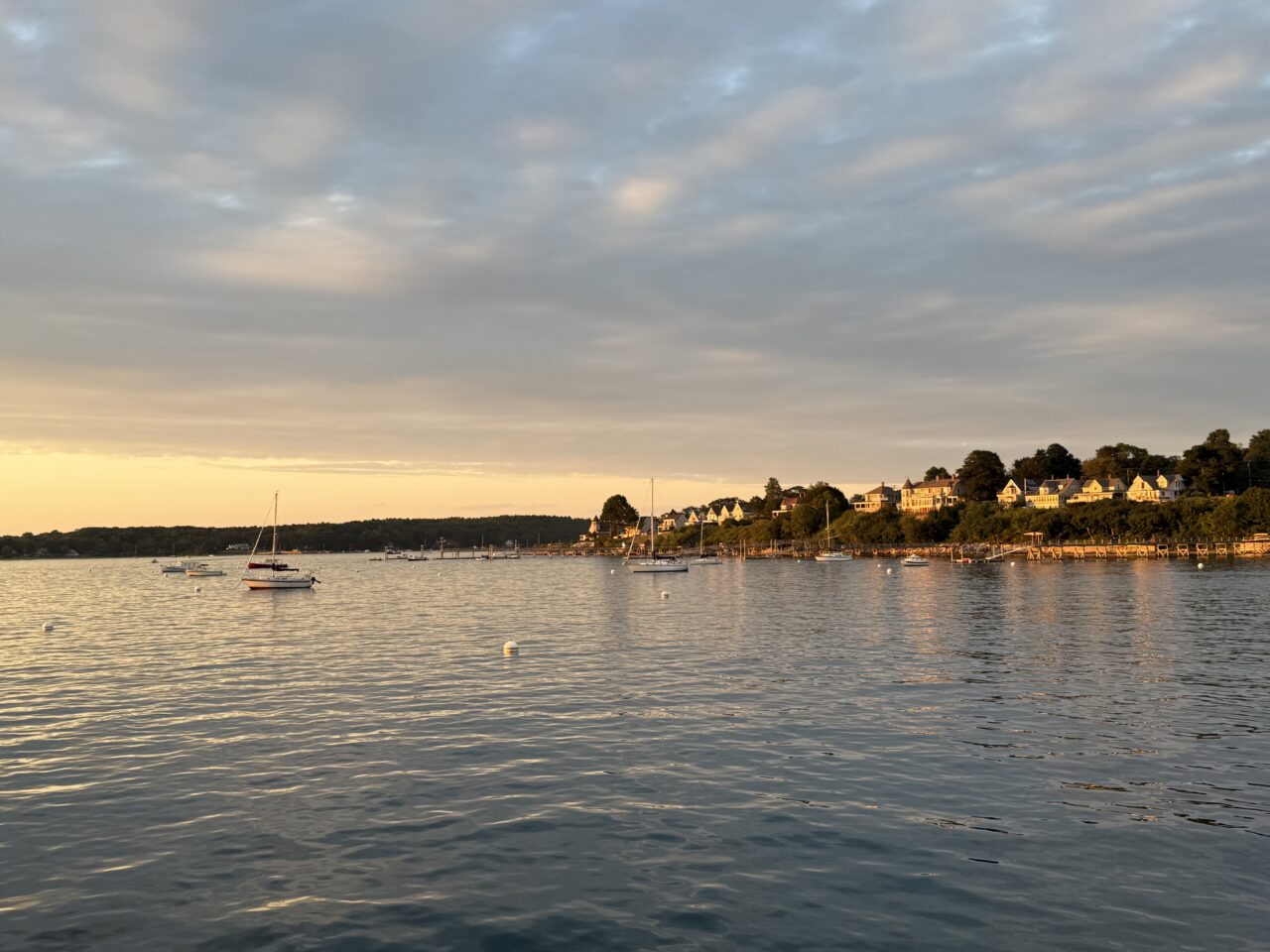 Sunset light over a Casco Bay harbor town near Portland, Maine